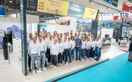 Group photo of the sitour feratel team at the stand at Interlapin 2025